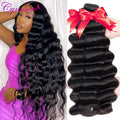 Long dark wavy hair on a model beside hair bundles
