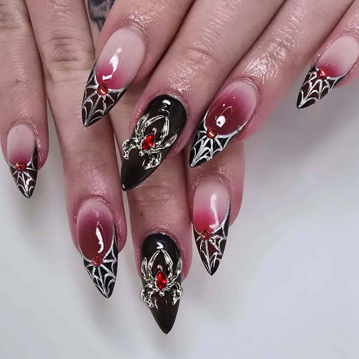 Decorated nail designs shown on hands