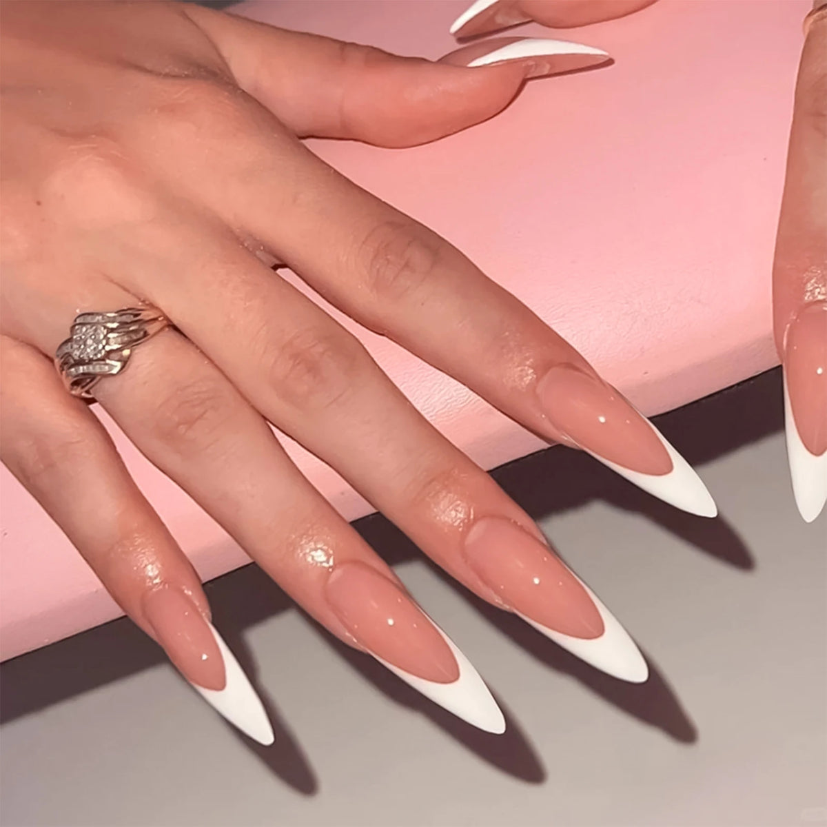 Decorated nail designs shown on hands