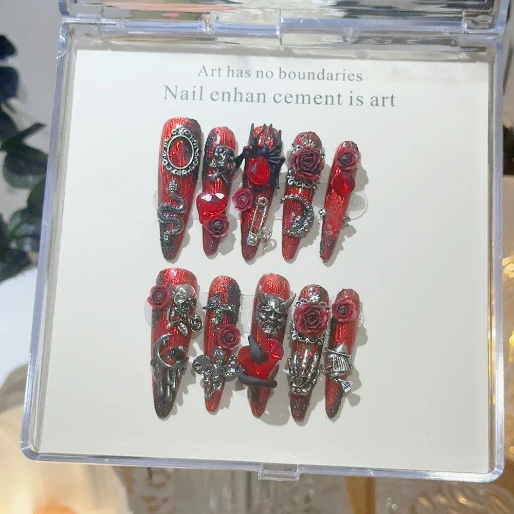 Decorated press-on nail sets with raised embellishments on display cards