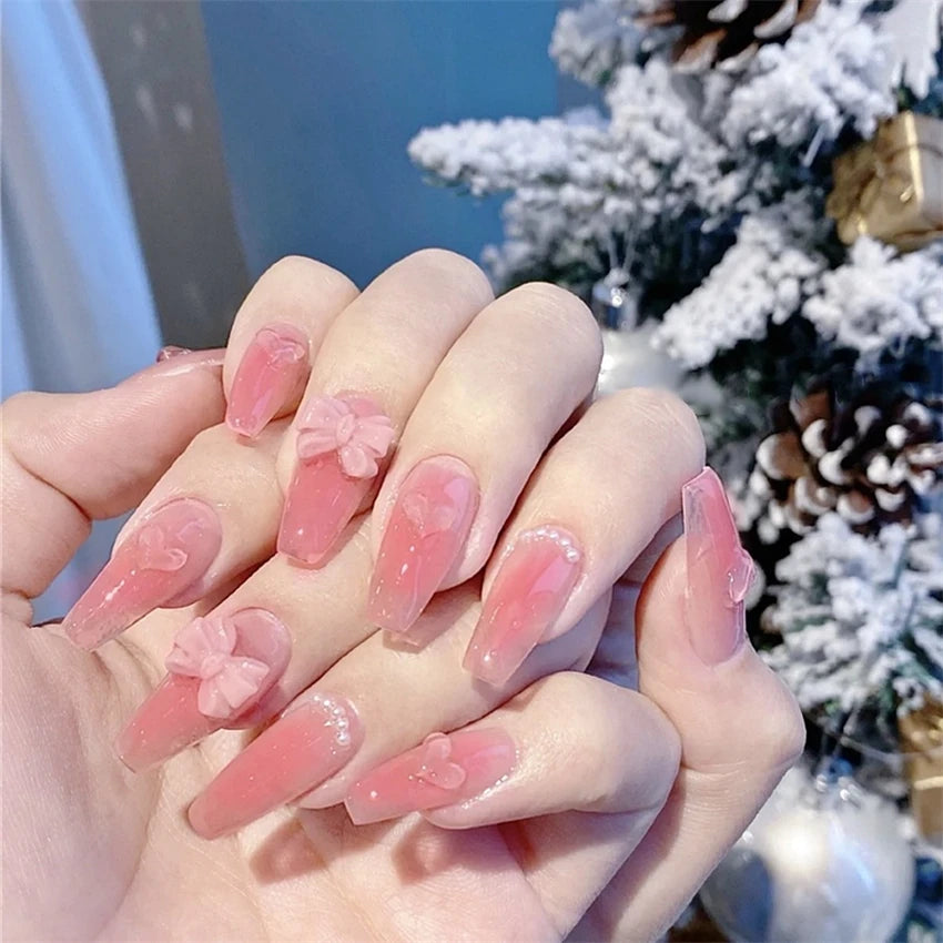 Decorated nail designs shown on hands
