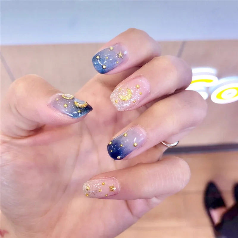 Decorated nail designs shown on hands