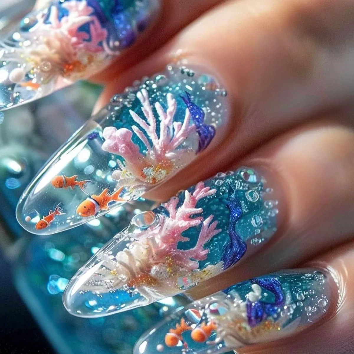 Close-up of blue marine-themed decorated nails