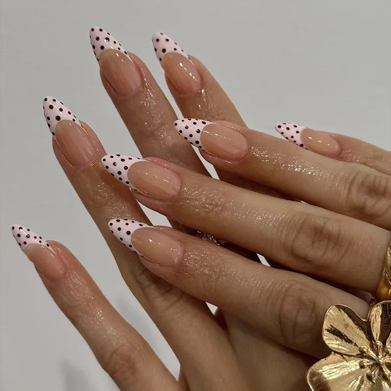 Decorated nail designs shown on hands