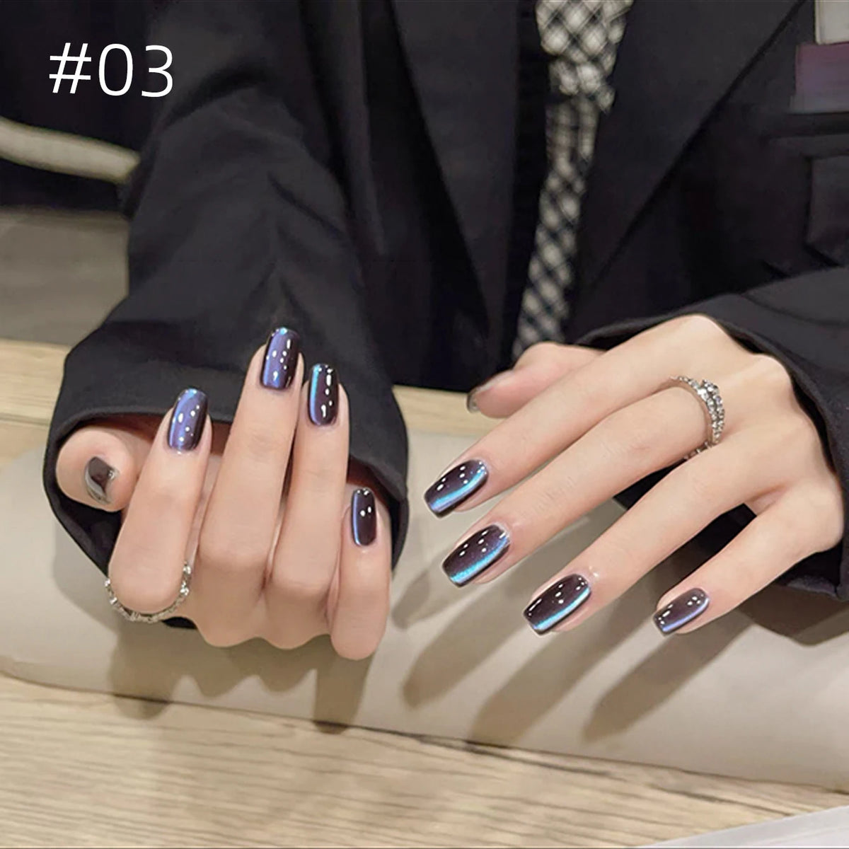Numbered chrome nail shade shown on hands