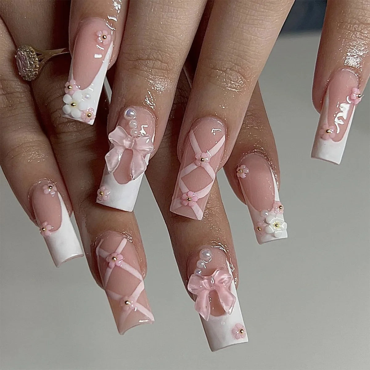 Decorative nail designs shown on hands