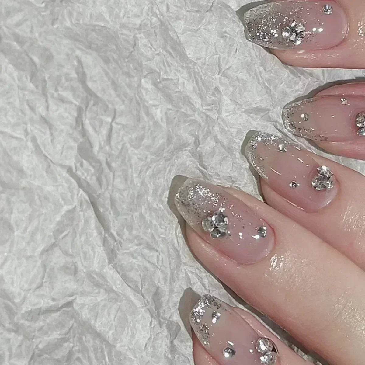 Decorated nail designs shown on hands