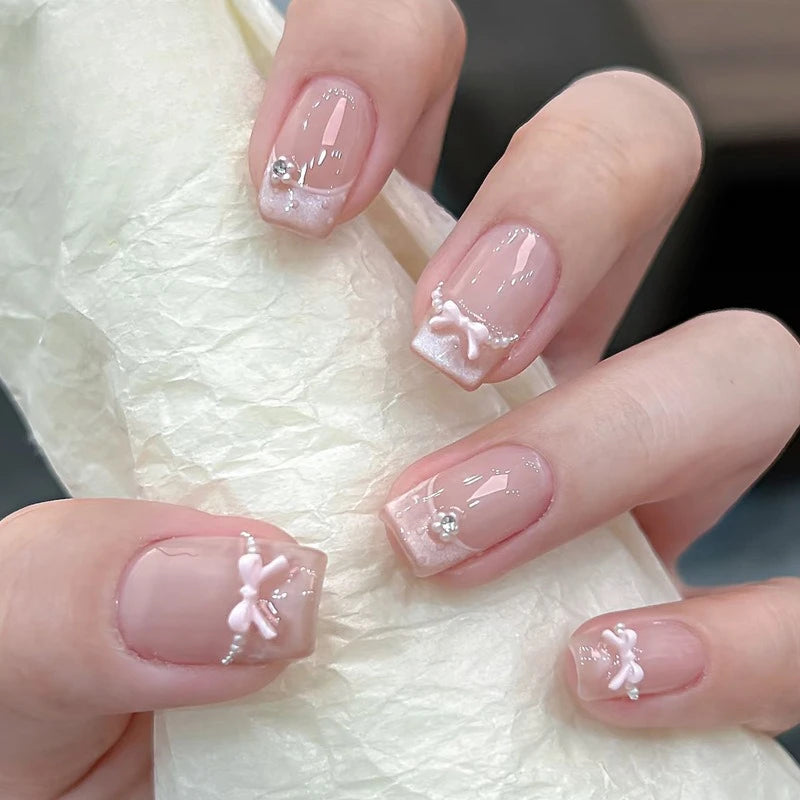 Decorated nail designs shown on hands