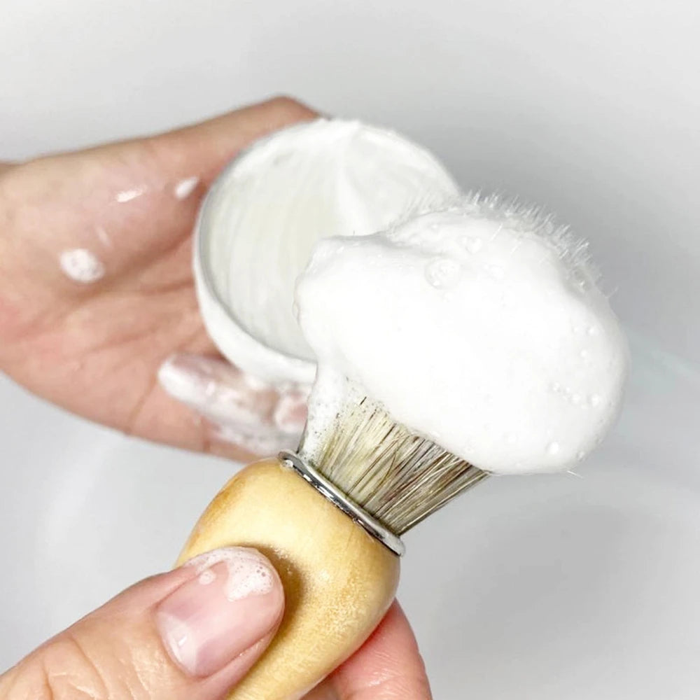 Shaving soap with lather and shaving brush application examples