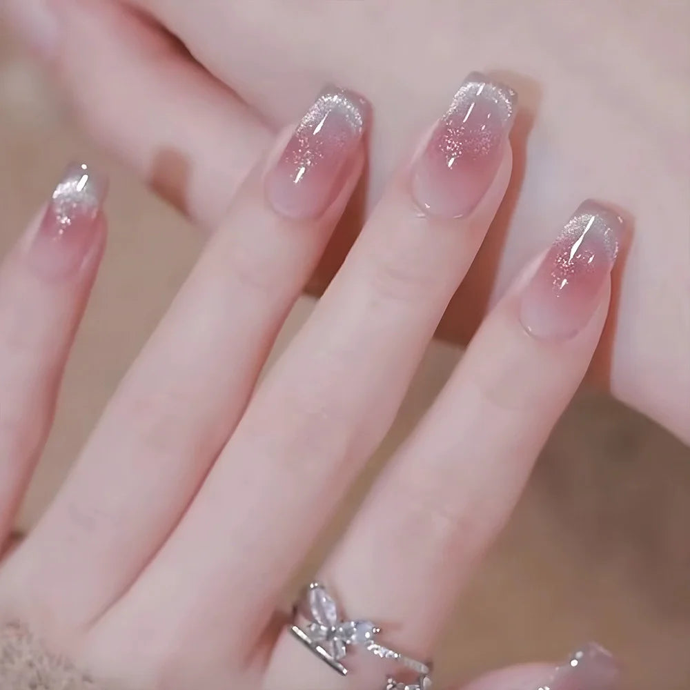 Decorated nail designs shown on hands