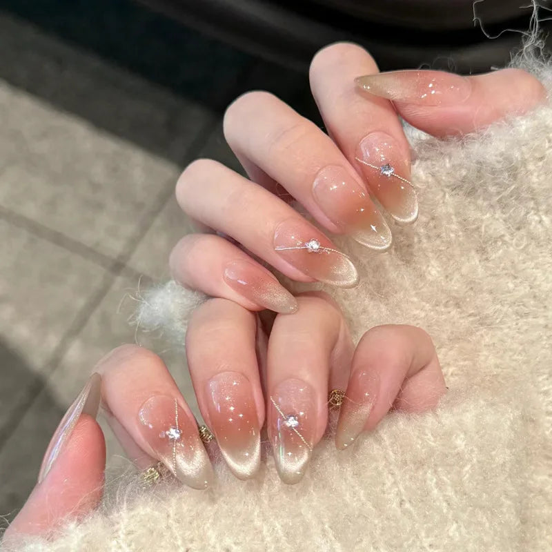 Decorated nails shown on hands