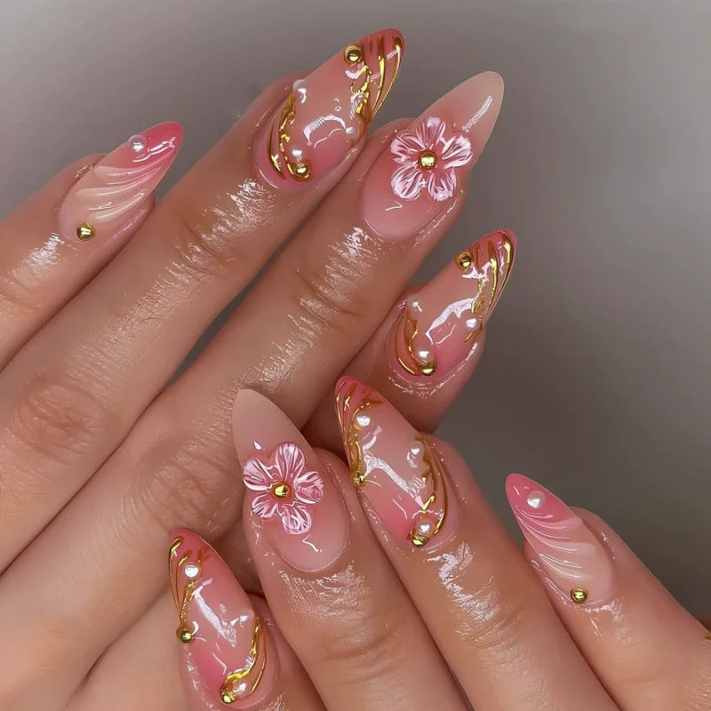 Decorated floral nails shown on hands