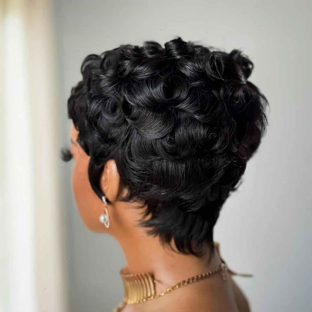 Short curly wig shown from different angles