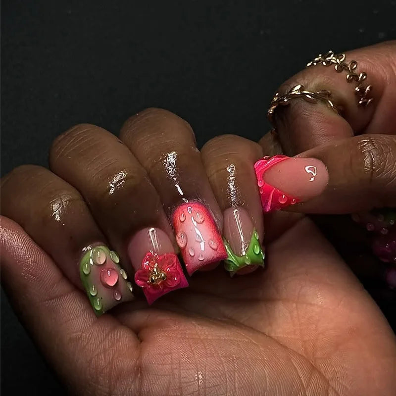 Decorative nail designs with raised accents shown on hands