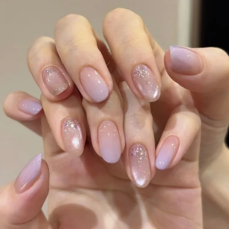 Decorated nail designs shown on hands