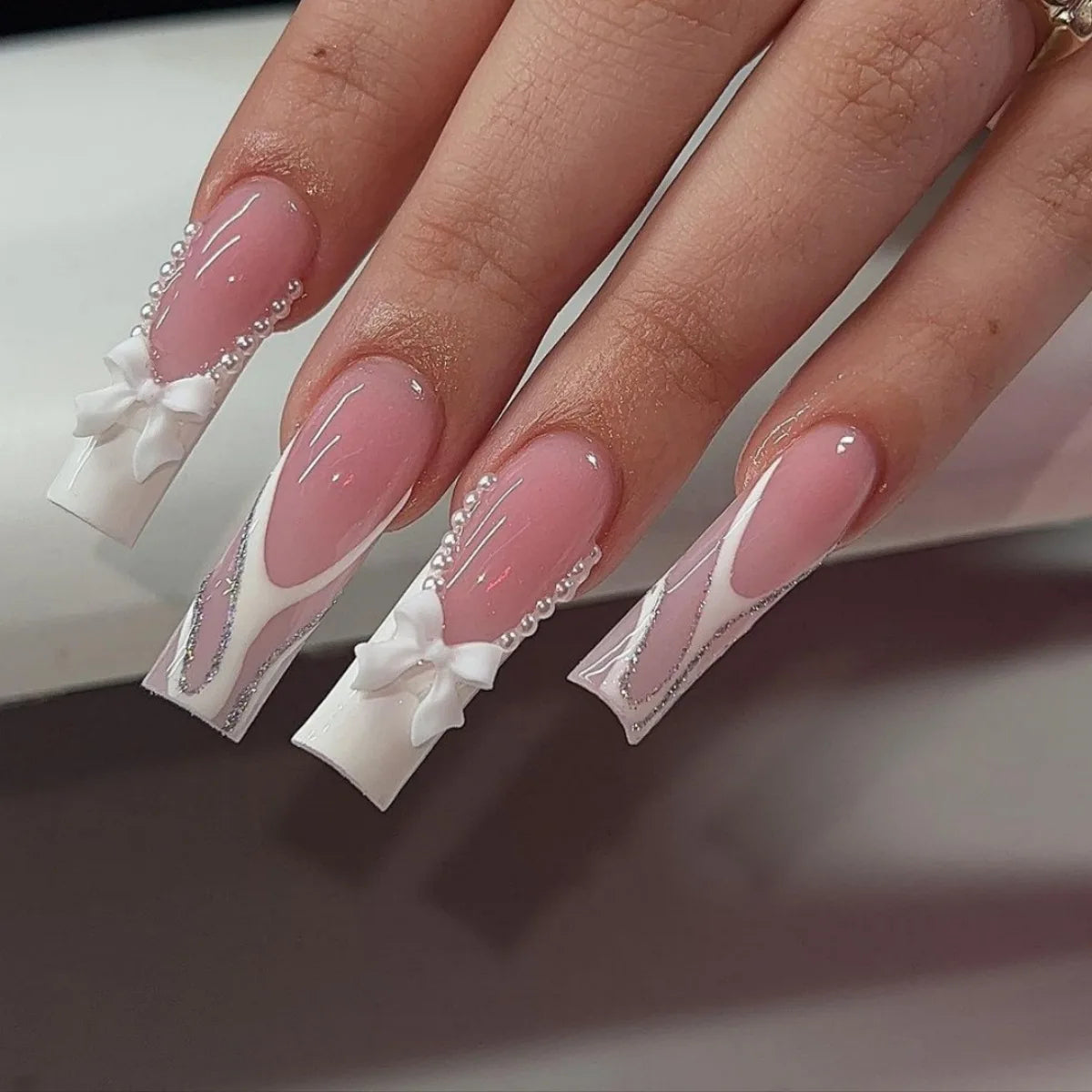 Decorated nail designs shown on hands