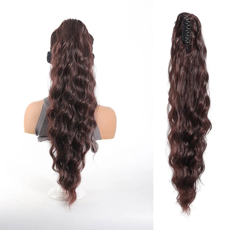 Long wavy ponytail extension shown on a mannequin and laid out