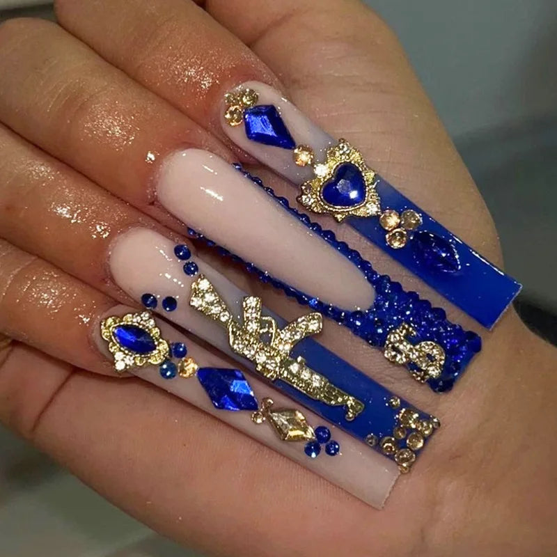 Long decorated nail designs shown on hands