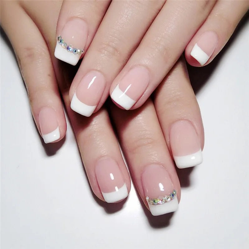 Decorated nail designs shown on hands