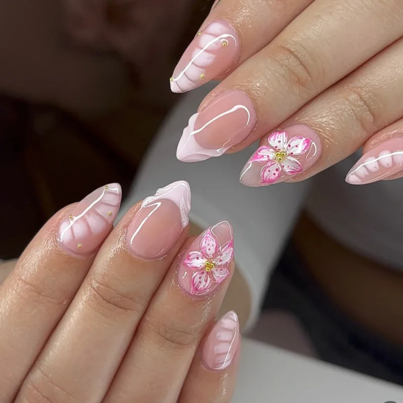 Decorated nails shown on hands
