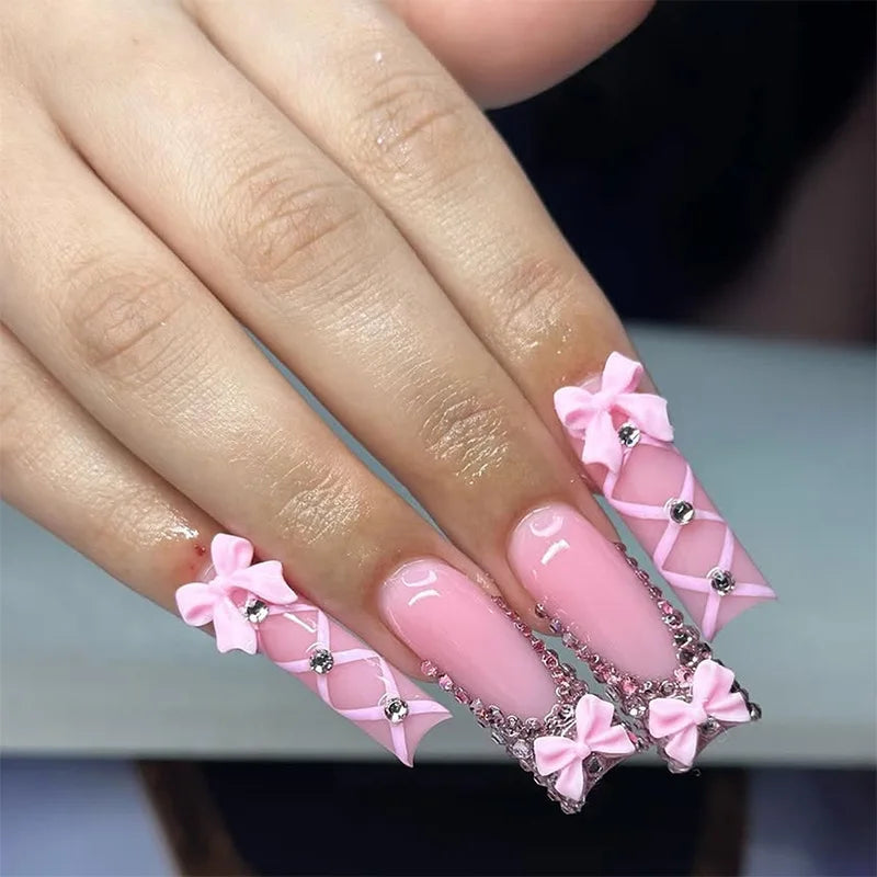 Decorated nail designs shown on hands