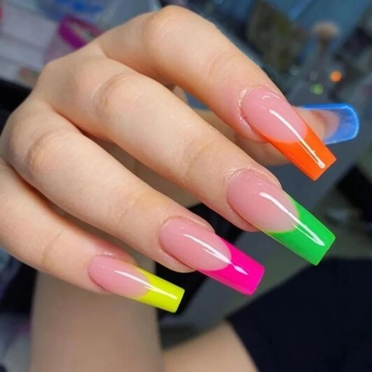 Decorative nail designs shown on hands
