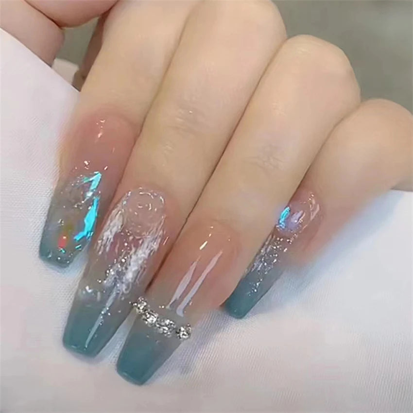 Decorated nail designs shown on hands
