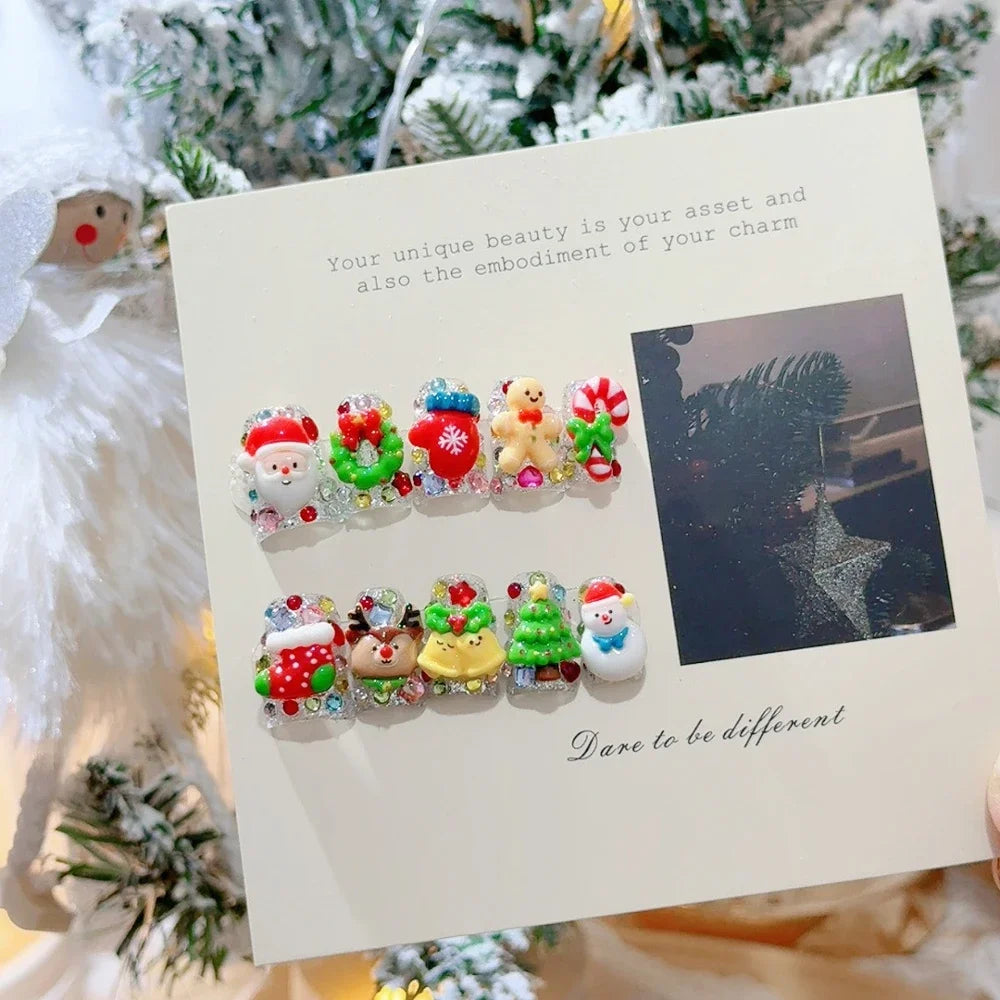 Decorated press-on nail sets with raised embellishments on display cards