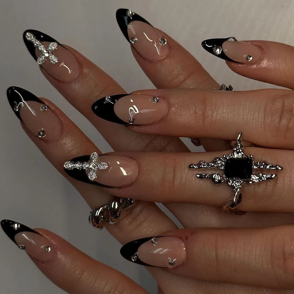 Decorated nail designs shown on hands