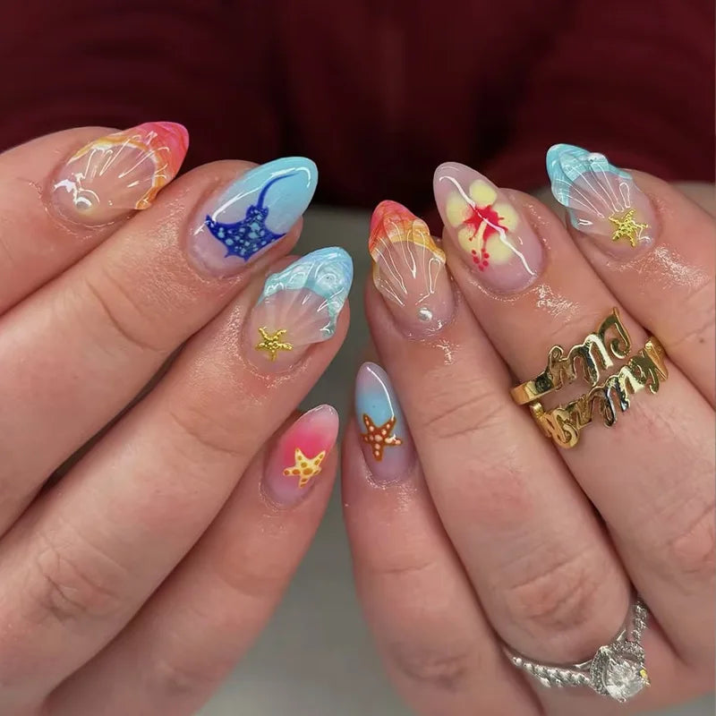 Decorated nail designs shown on hands