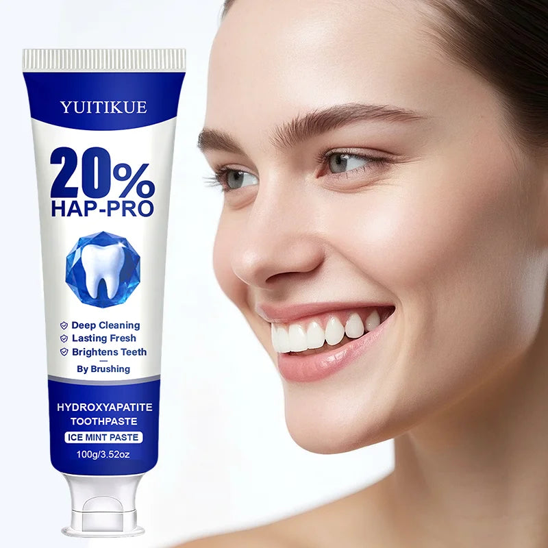 Hydroxyapatite toothpaste tube with smile and tooth care graphics