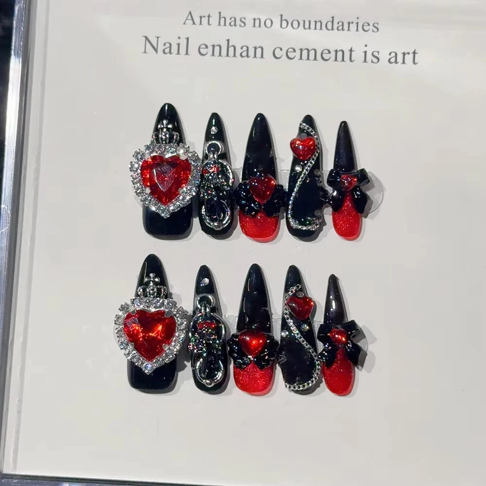 Decorated press-on nail sets with raised embellishments on display cards
