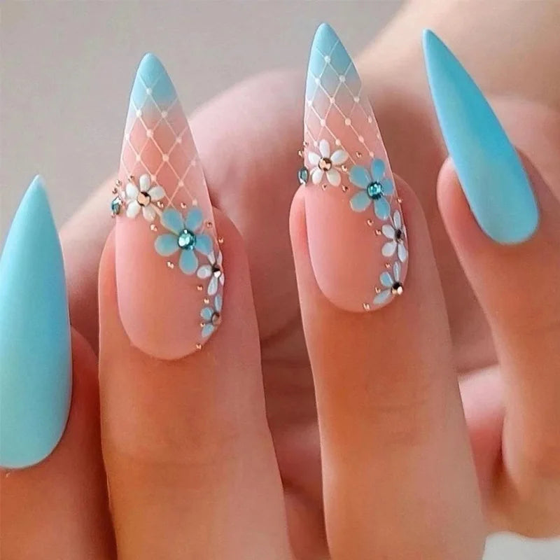 Decorated nail designs shown on hands