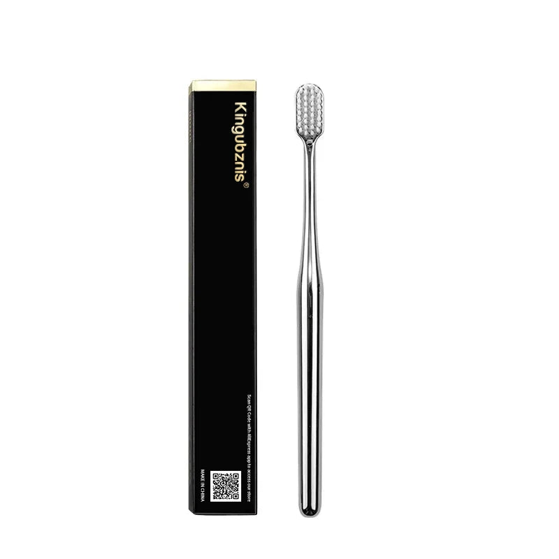 Toothbrush beside its slim box