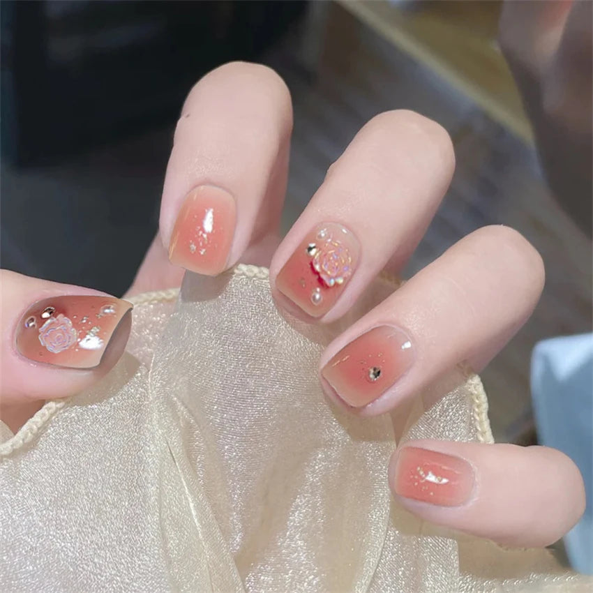 Decorated nail designs shown on hands