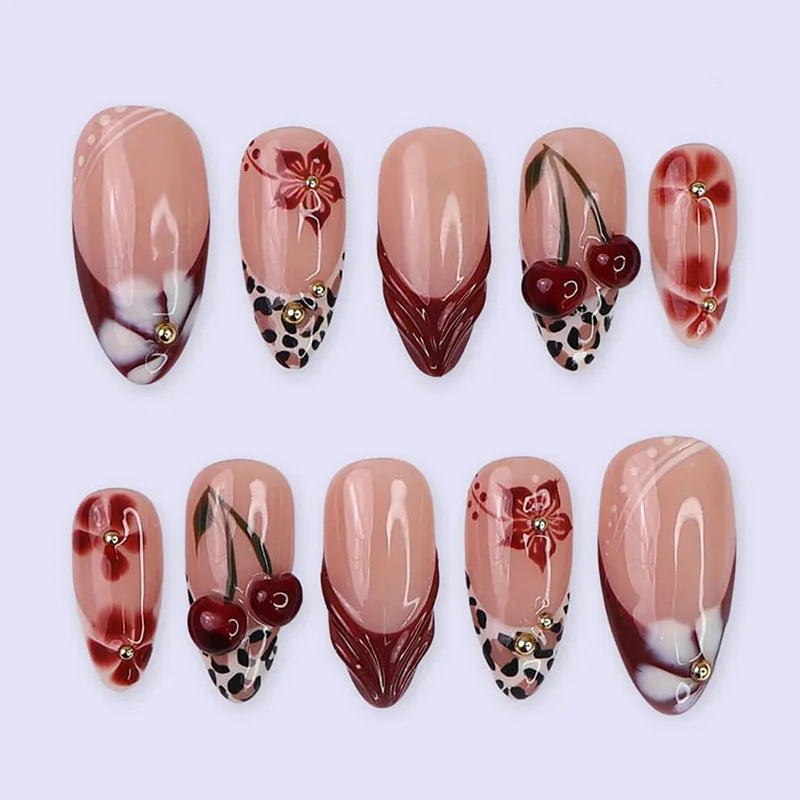 Decorated press-on nails arranged in rows