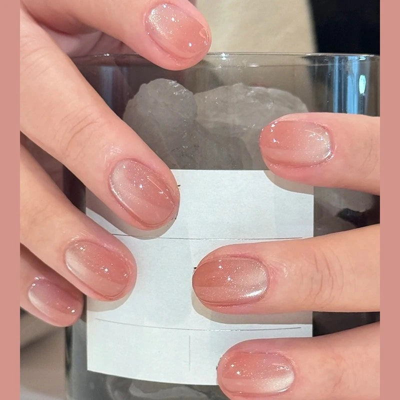 Decorated nail designs shown on hands