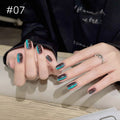 Numbered chrome nail shade shown on hands