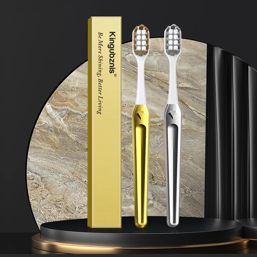 Gold and silver toothbrushes with bristle and handle details