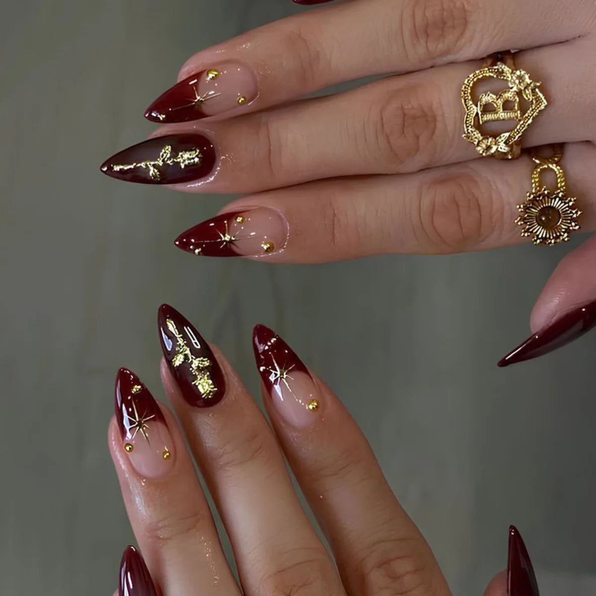 Decorated nail designs shown on hands