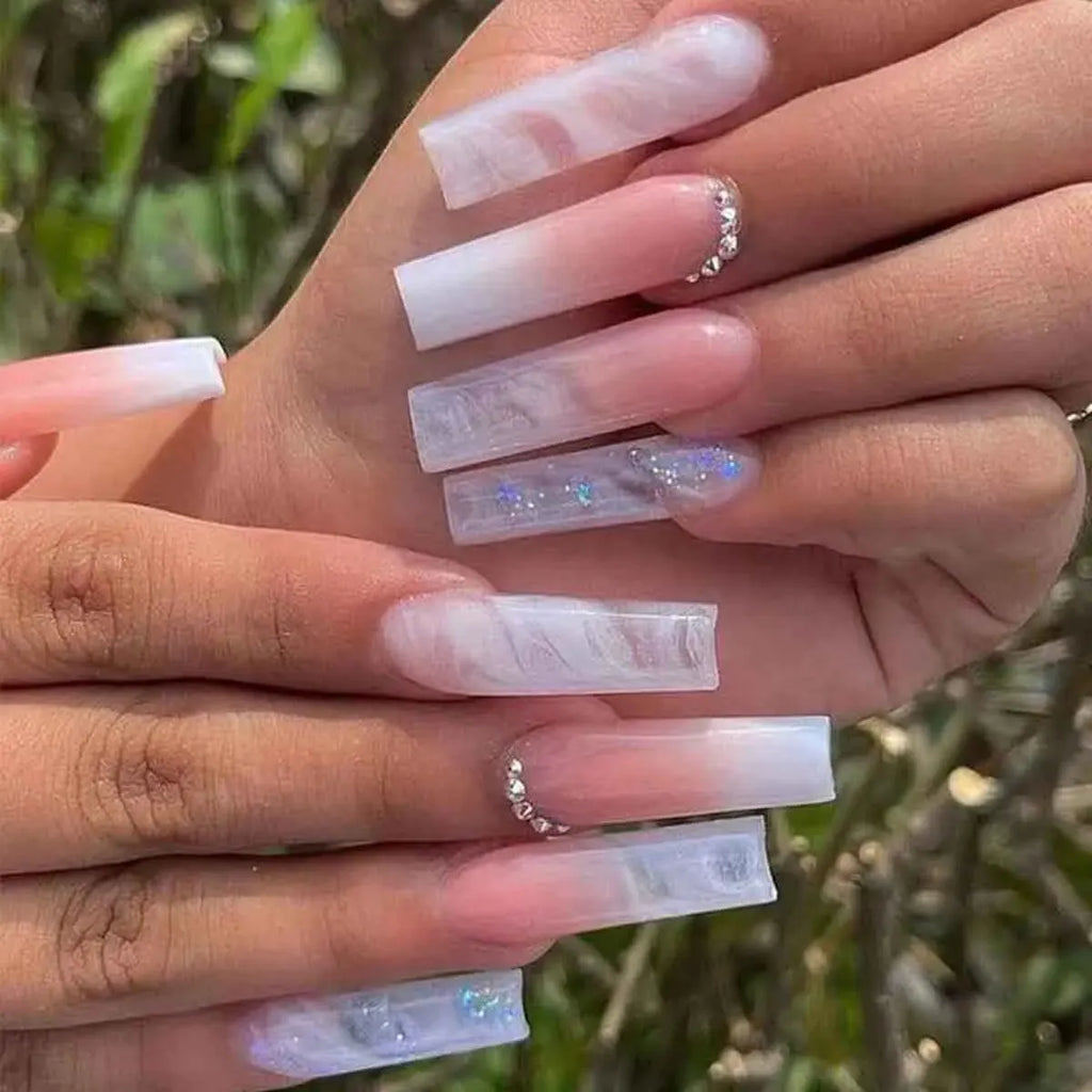 Pastel long nail design shown on hands