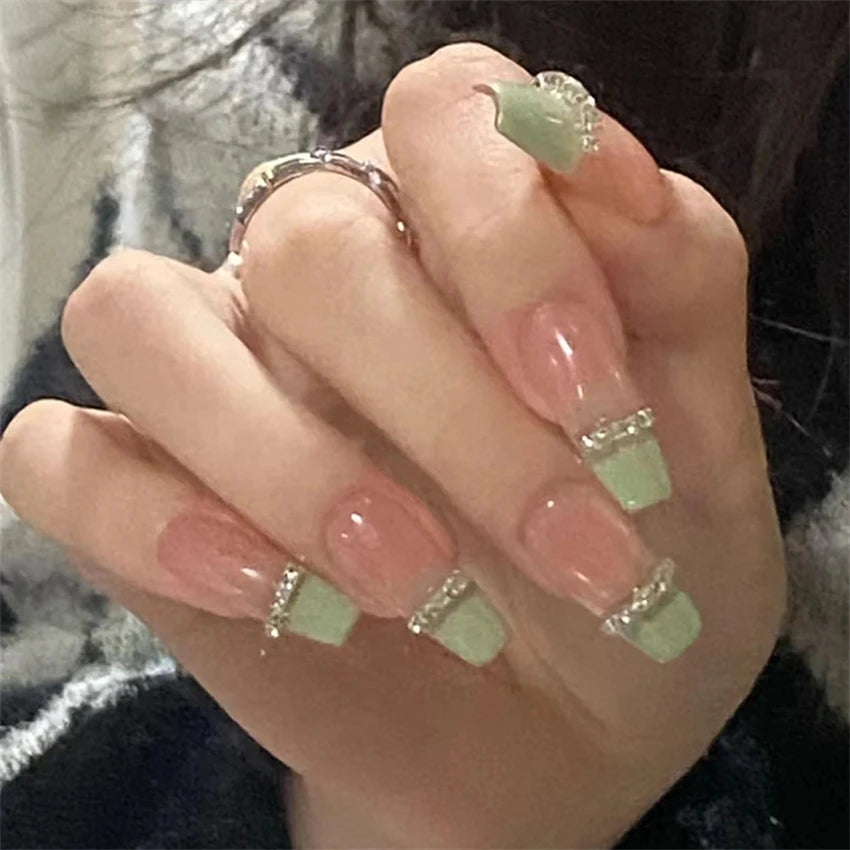 Decorated nail designs shown on hands