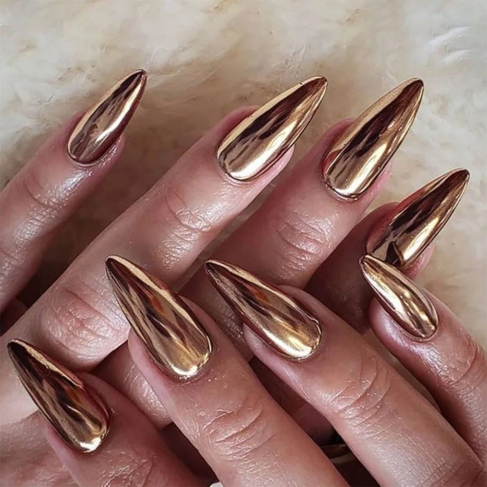 Long decorative nail designs with raised accents shown on hands