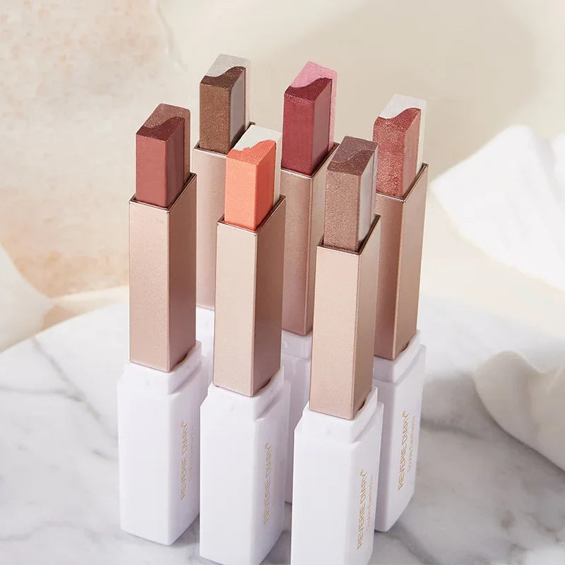 Dual-color eyeshadow sticks and packaging