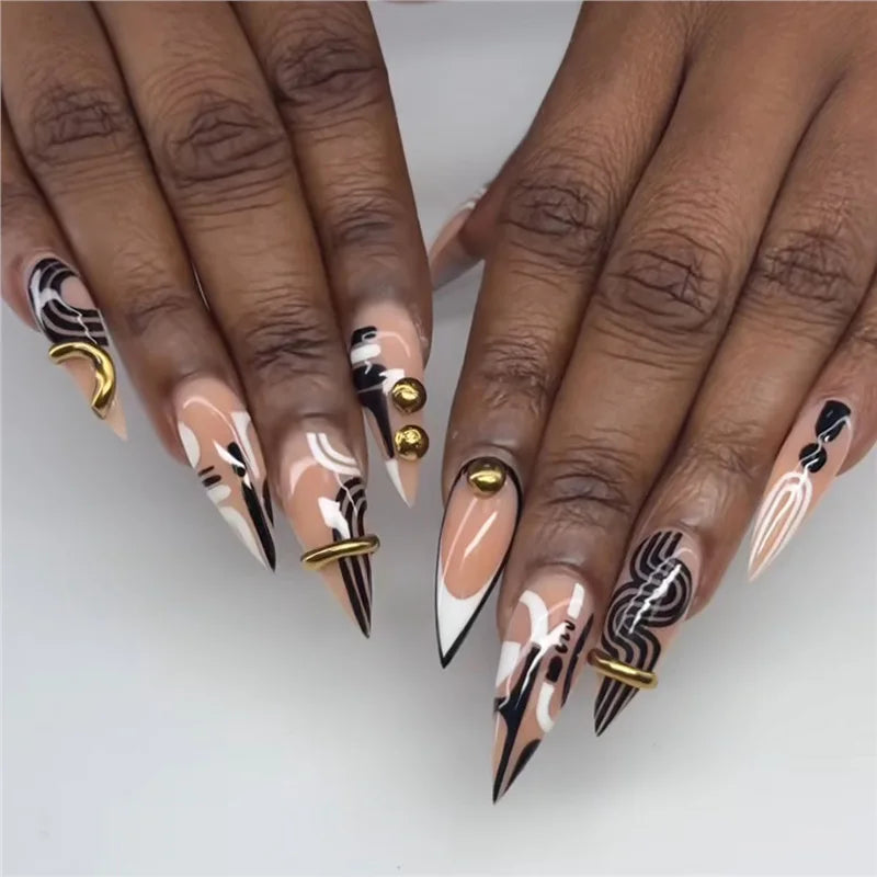 Long decorative nail designs with raised embellishments shown on hands