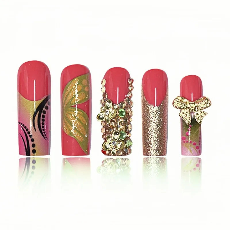 Decorated press-on nails arranged in rows