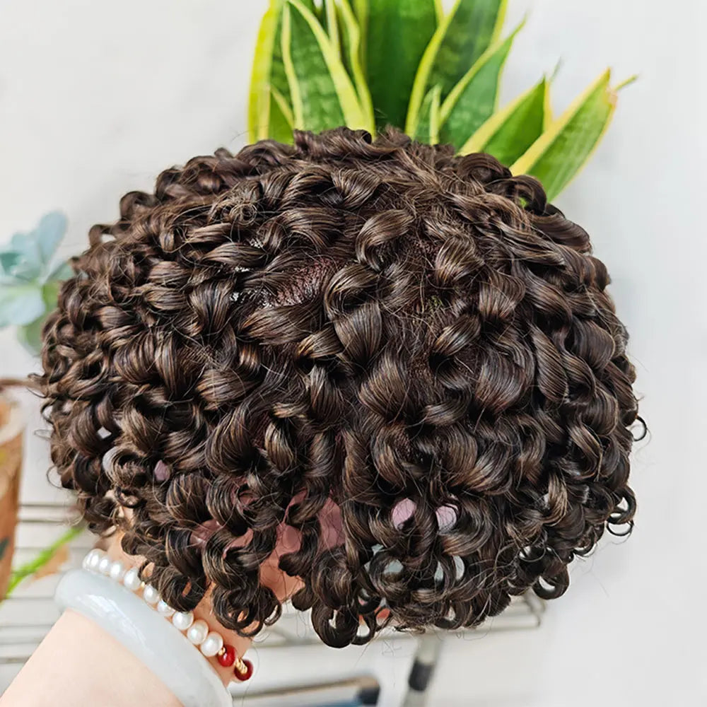 Curly brown toupee viewed from above
