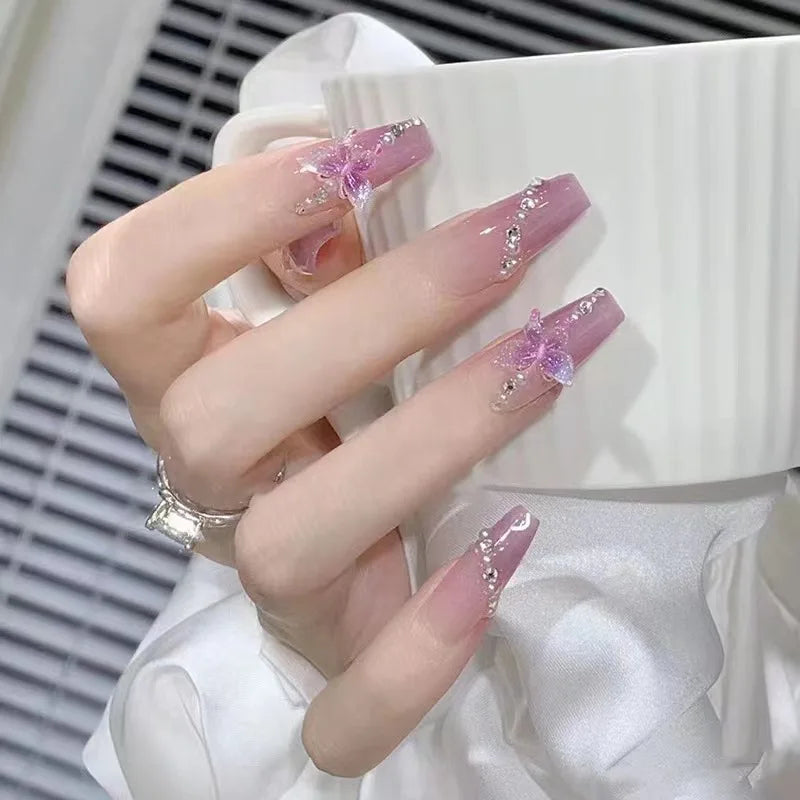 Decorated nails shown on a hand