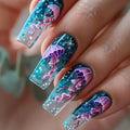 Blue marine-themed nail designs shown on hands
