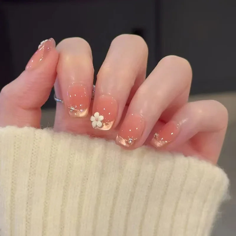 Decorated nail designs shown on hands